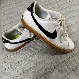 Nike White Sneakers with Black Swoosh and Gum Sole